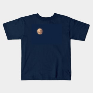 Full moon at dusk glowing against blue starry sky Kids T-Shirt